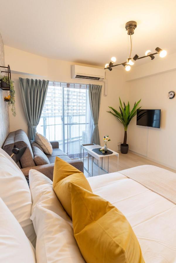 Bijou Suites Lieto Apm Osaka Esterno foto