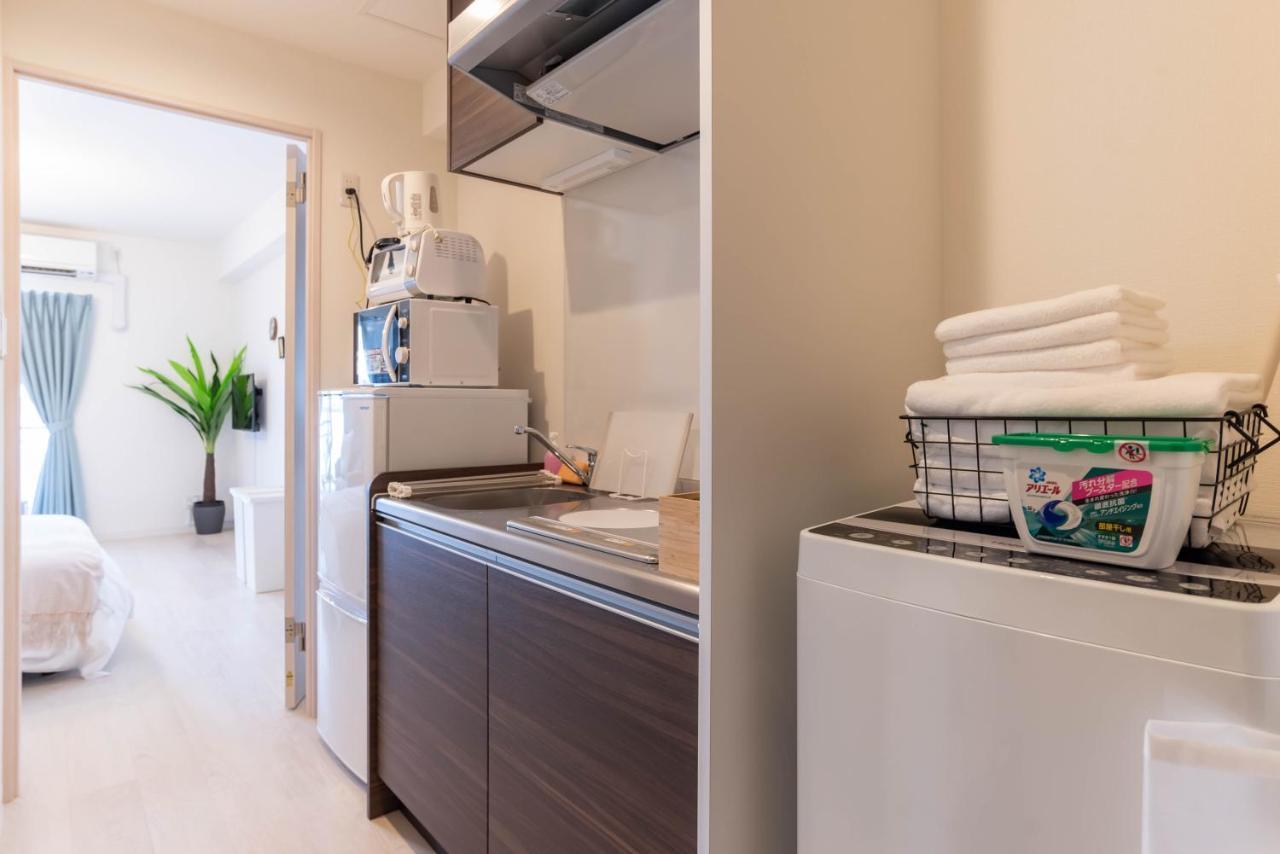 Bijou Suites Lieto Apm Osaka Esterno foto